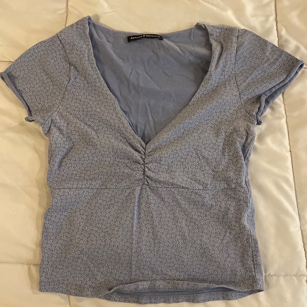 brandy melville pastel blue with little white flowers v-neck top